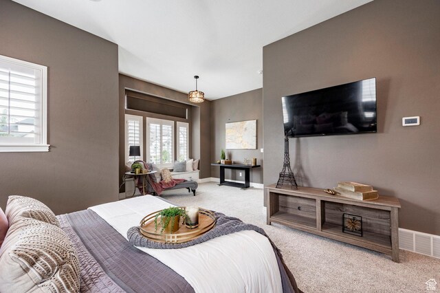 1309 W Atrium Ct W, Farmington, UT 84025 - carpeted bedroom featuring baseboards