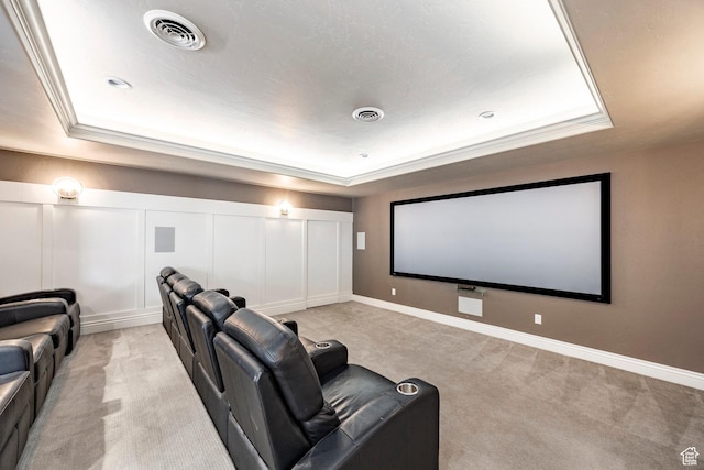 1309 W Atrium Ct W, Farmington, UT 84025 - cinema featuring a raised ceiling, light carpet, and baseboards
