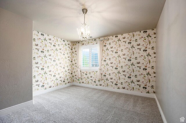 1309 W Atrium Ct W, Farmington, UT 84025 - spare room featuring a chandelier, wallpapered walls, carpet flooring, and baseboards