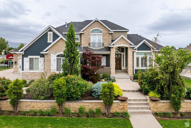 1309 W Atrium Ct W, Farmington, UT 84025 - craftsman-style home featuring stone siding, covered porch, and a shingled roof
