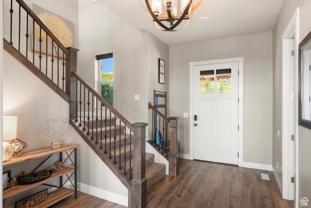 68 Hawksbeard Cir, Fish Haven, ID 83287 - foyer entrance with a chandelier, wood finished floors, and stairs