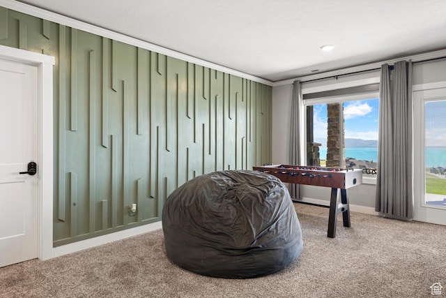 68 Hawksbeard Cir, Fish Haven, ID 83287 - living area with a water view, carpet, and crown molding