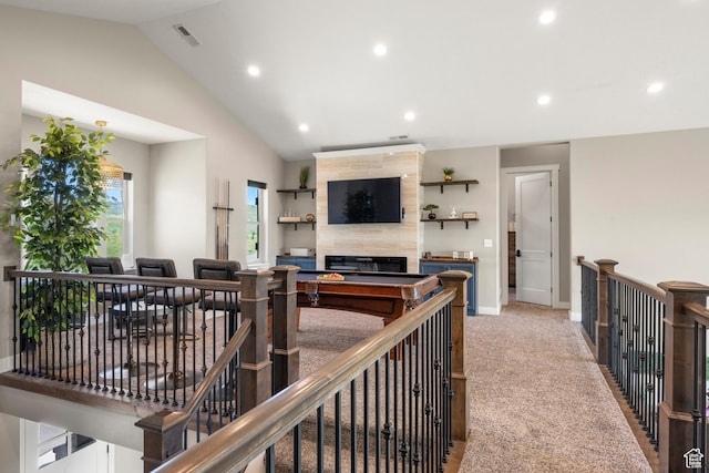 68 Hawksbeard Cir, Fish Haven, ID 83287 - living area featuring recessed lighting, a fireplace, vaulted ceiling, and light colored carpet