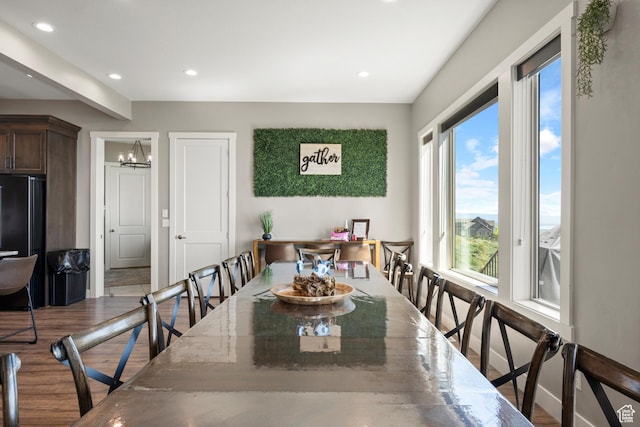 68 Hawksbeard Cir, Fish Haven, ID 83287 - dining area featuring recessed lighting, a chandelier, and wood finished floors