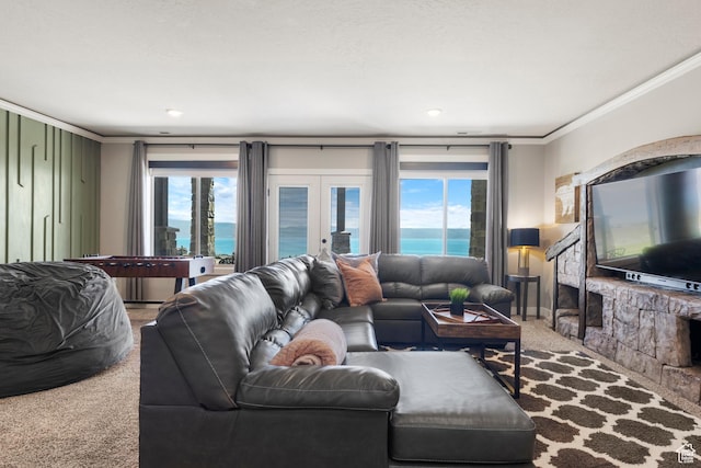 68 Hawksbeard Cir, Fish Haven, ID 83287 - carpeted living room with ornamental molding, french doors, and healthy amount of natural light