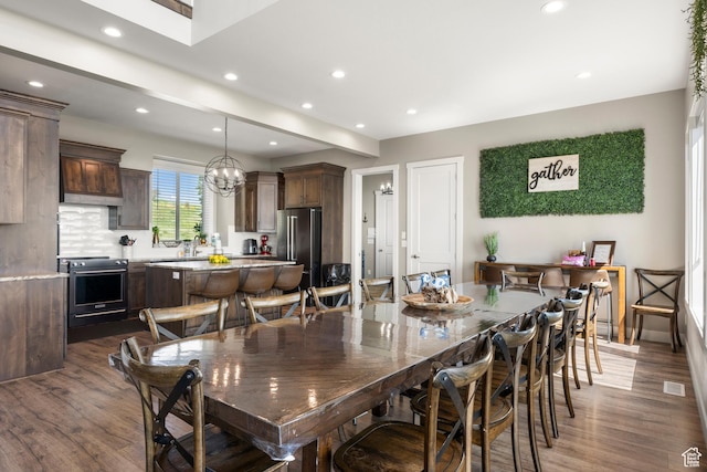 68 Hawksbeard Cir, Fish Haven, ID 83287 - dining room with wood finished floors, recessed lighting, and a chandelier