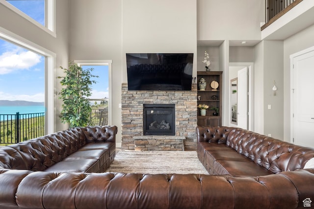 68 Hawksbeard Cir, Fish Haven, ID 83287 - living room with a towering ceiling and a stone fireplace