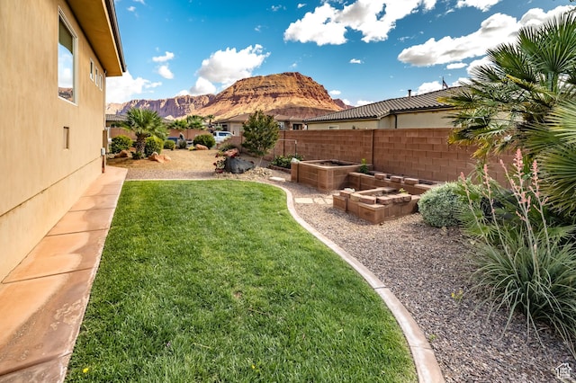 373 W Meridian Dr, Ivins, UT 84738 - view of yard with a mountain view and a vegetable garden