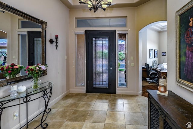 373 W Meridian Dr, Ivins, UT 84738 - entryway featuring arched walkways, healthy amount of natural light, a chandelier, and light tile patterned floors