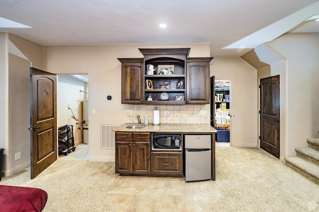 373 W Meridian Dr, Ivins, UT 84738 - bar area with black microwave, freestanding refrigerator, a sink, decorative backsplash, and recessed lighting