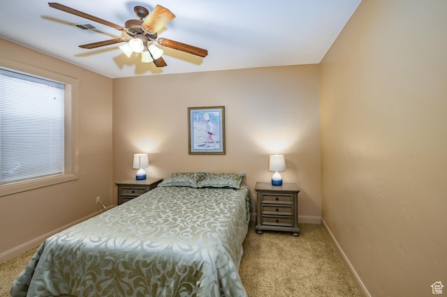 373 W Meridian Dr, Ivins, UT 84738 - carpeted bedroom featuring baseboards and a ceiling fan