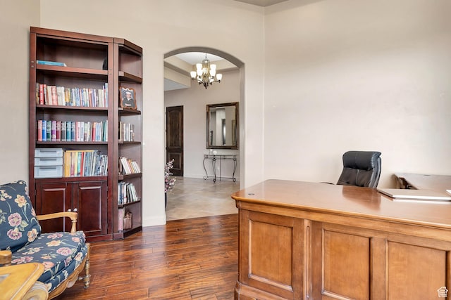 373 W Meridian Dr, Ivins, UT 84738 - office featuring arched walkways, dark wood finished floors, and a chandelier