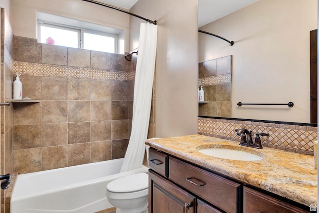 373 W Meridian Dr, Ivins, UT 84738 - full bathroom featuring shower / tub combo, vanity, and tasteful backsplash
