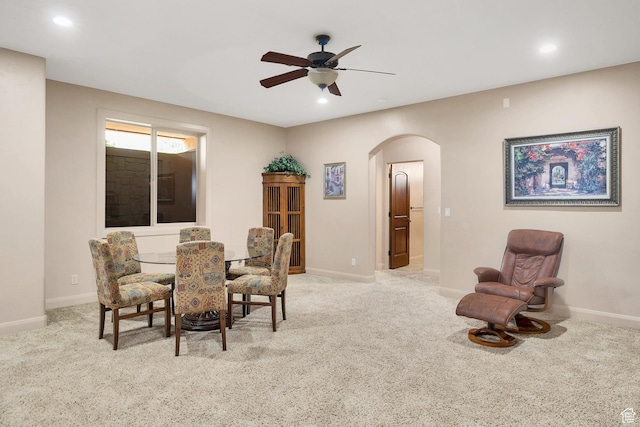 373 W Meridian Dr, Ivins, UT 84738 - dining area with arched walkways, a ceiling fan, light colored carpet, and recessed lighting