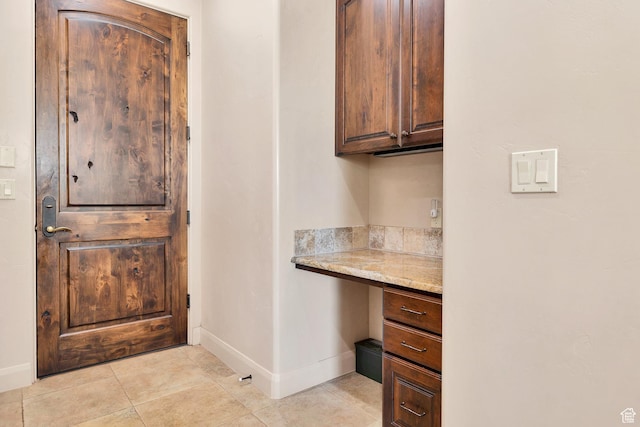 373 W Meridian Dr, Ivins, UT 84738 - office space featuring built in desk and light tile patterned floors