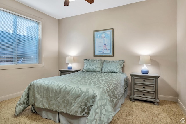 373 W Meridian Dr, Ivins, UT 84738 - carpeted bedroom with baseboards and ceiling fan