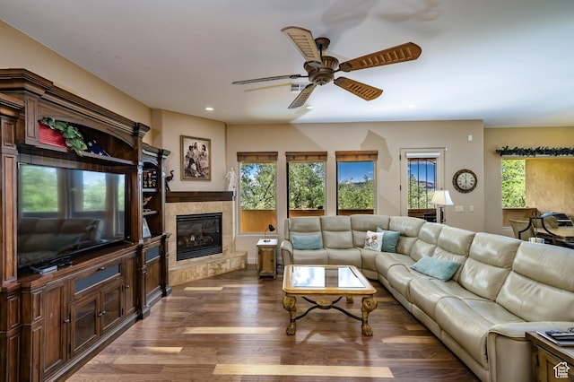 373 W Meridian Dr, Ivins, UT 84738 - living area featuring ceiling fan, wood finished floors, a tiled fireplace, and recessed lighting