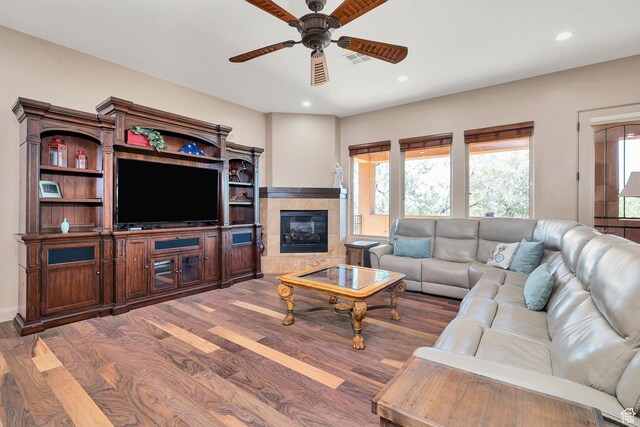 373 W Meridian Dr, Ivins, UT 84738 - living area with wood finished floors, a ceiling fan, healthy amount of natural light, recessed lighting, and a premium fireplace