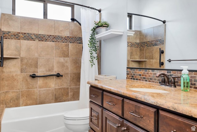 373 W Meridian Dr, Ivins, UT 84738 - bathroom with vanity, shower / bathtub combination with curtain, and tasteful backsplash