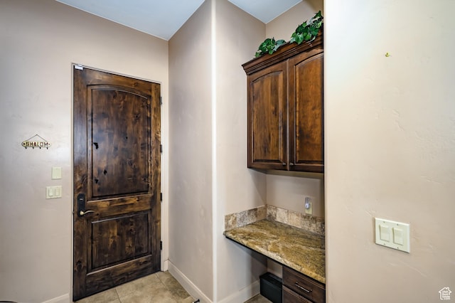 373 W Meridian Dr, Ivins, UT 84738 - foyer with baseboards, light tile patterned floors, and built in study area