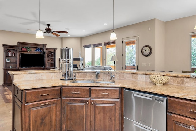 373 W Meridian Dr, Ivins, UT 84738 - kitchen featuring stainless steel dishwasher, open floor plan, light stone counters, a ceiling fan, and decorative light fixtures