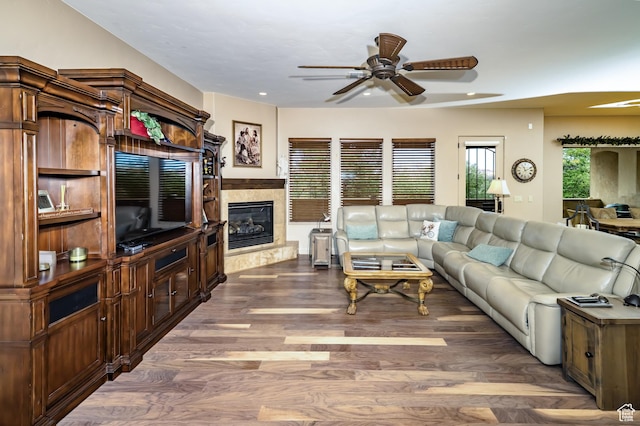 373 W Meridian Dr, Ivins, UT 84738 - living room featuring a ceiling fan, a tiled fireplace, wood finished floors, and recessed lighting