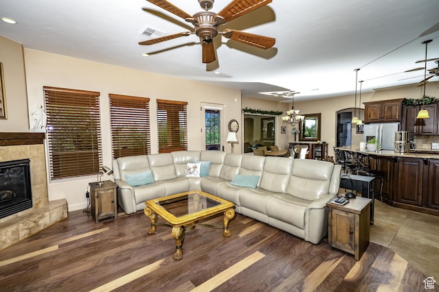 373 W Meridian Dr, Ivins, UT 84738 - living area featuring ceiling fan, wood finished floors, and a high end fireplace