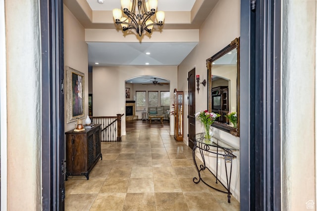 373 W Meridian Dr, Ivins, UT 84738 - hallway featuring arched walkways, a chandelier, and recessed lighting