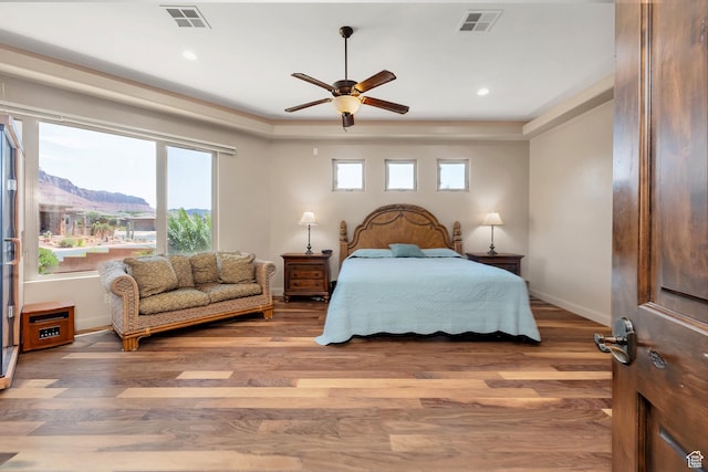373 W Meridian Dr, Ivins, UT 84738 - bedroom with wood finished floors, recessed lighting, and a ceiling fan
