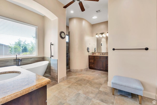 373 W Meridian Dr, Ivins, UT 84738 - full bathroom featuring ceiling fan, vanity, a freestanding bath, and recessed lighting