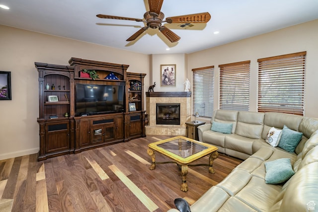 373 W Meridian Dr, Ivins, UT 84738 - living area with a ceiling fan, wood finished floors, recessed lighting, baseboards, and a tiled fireplace