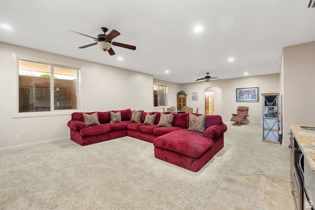 373 W Meridian Dr, Ivins, UT 84738 - living room featuring ceiling fan, recessed lighting, light carpet, and arched walkways