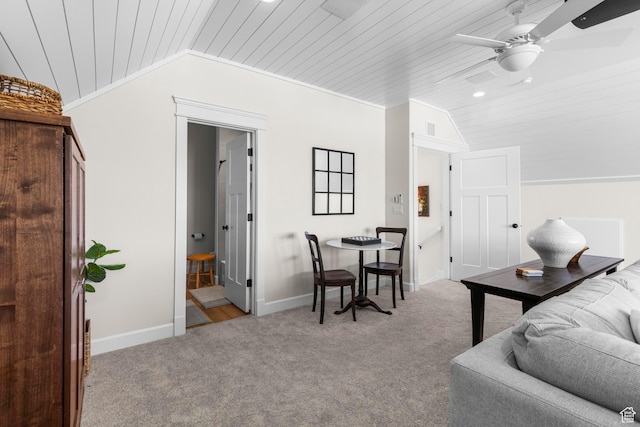 living room featuring wooden ceiling, lofted ceiling, carpet floors, a ceiling fan, and baseboards