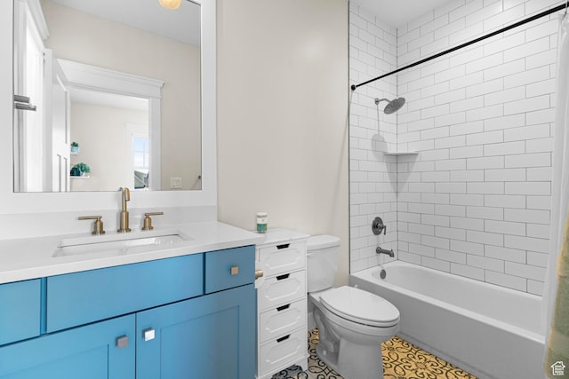 full bathroom featuring toilet, vanity, and  shower combination