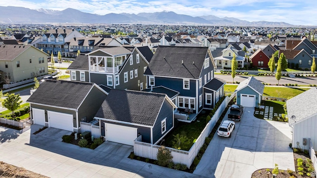 aerial view of residential area featuring a mountain backdrop