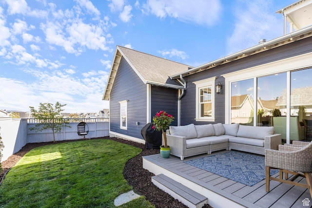 wooden terrace with outdoor lounge area
