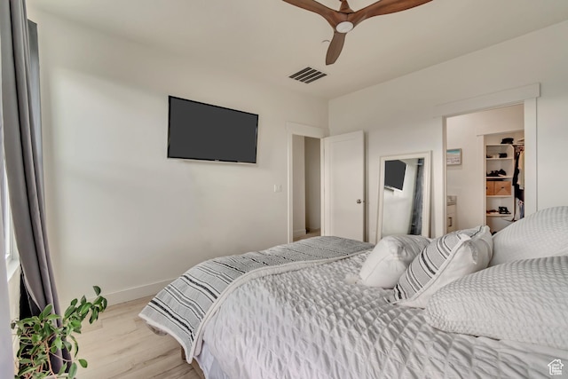 11233 S Clear Blue Dr Unit 402, South Jordan, UT 84009 - bedroom with light wood-style floors, baseboards, and a ceiling fan