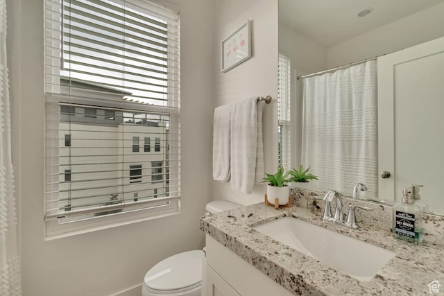 11233 S Clear Blue Dr Unit 402, South Jordan, UT 84009 - bathroom featuring toilet, vanity, and a shower with shower curtain