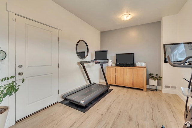 11233 S Clear Blue Dr Unit 402, South Jordan, UT 84009 - exercise room featuring light wood-style flooring and baseboards