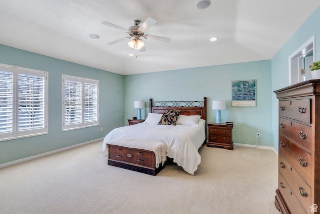 carpeted bedroom featuring baseboards, a ceiling fan, and recessed lighting