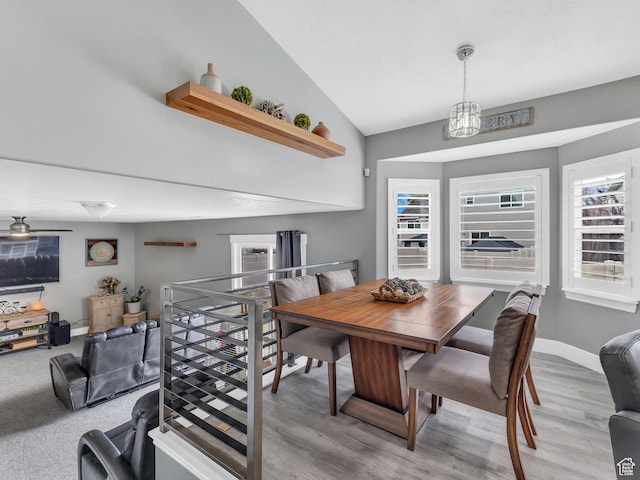 156 Crystal Bay Dr, Stansbury Park, UT 84074 - dining space with lofted ceiling and light wood-style floors