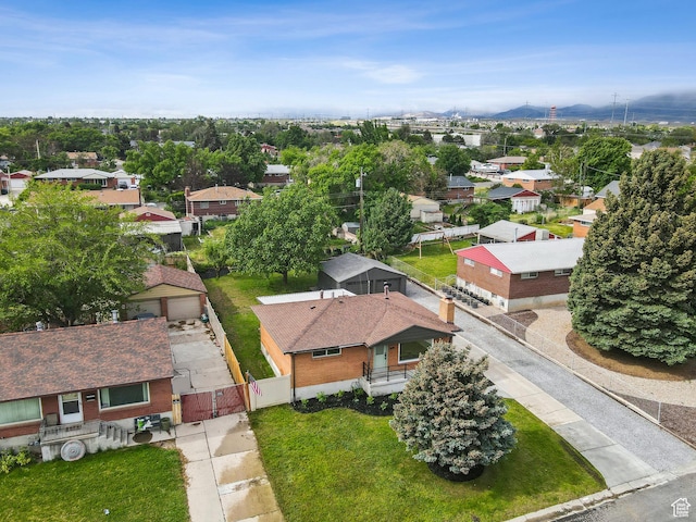 aerial view of residential area with mountains