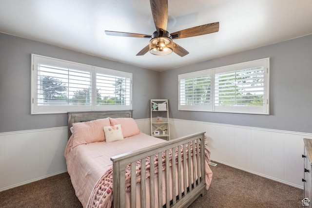 1256 E Darby Cir S, Murray, UT 84117 - carpeted bedroom featuring wainscoting and ceiling fan