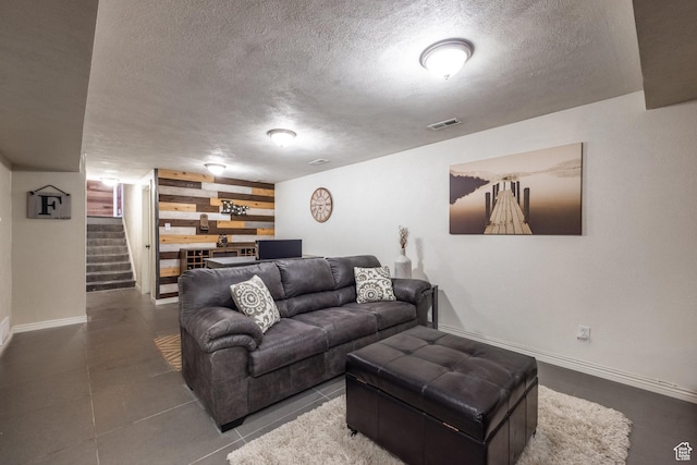 1256 E Darby Cir S, Murray, UT 84117 - living room with a textured ceiling, stairs, baseboards, and wood walls