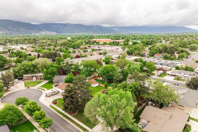 1256 E Darby Cir S, Murray, UT 84117 - aerial view of residential area featuring a mountain backdrop
