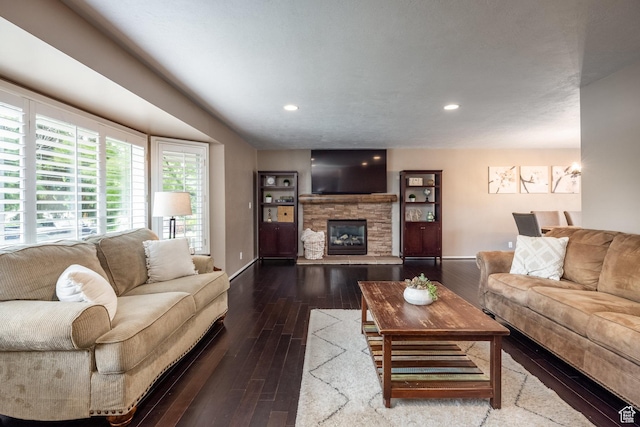 1256 E Darby Cir S, Murray, UT 84117 - living room featuring dark wood-style flooring, baseboards, a fireplace, and recessed lighting