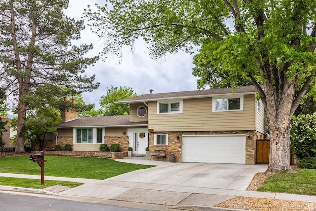 1256 E Darby Cir S, Murray, UT 84117 - split level home with a garage, concrete driveway, brick siding, and a chimney