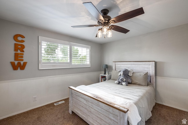 1256 E Darby Cir S, Murray, UT 84117 - carpeted bedroom with wainscoting and ceiling fan
