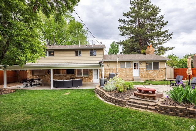 1256 E Darby Cir S, Murray, UT 84117 - rear view of property with a patio area, an outdoor living space, a chimney, and brick siding