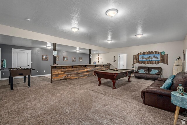 playroom featuring billiards table, carpet flooring, a textured ceiling, and baseboards